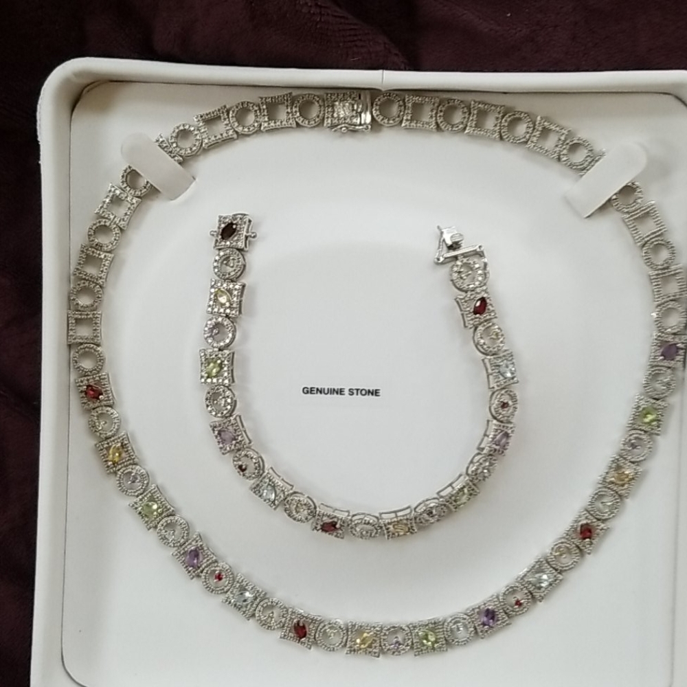 Sterling silver and gemstone necklace set.